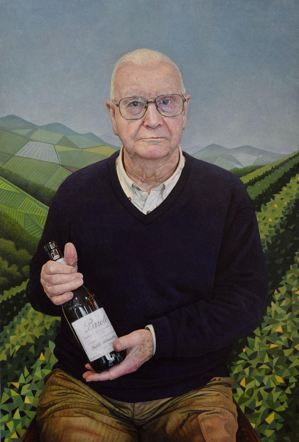 John Tiller with bottle of Barolo wine