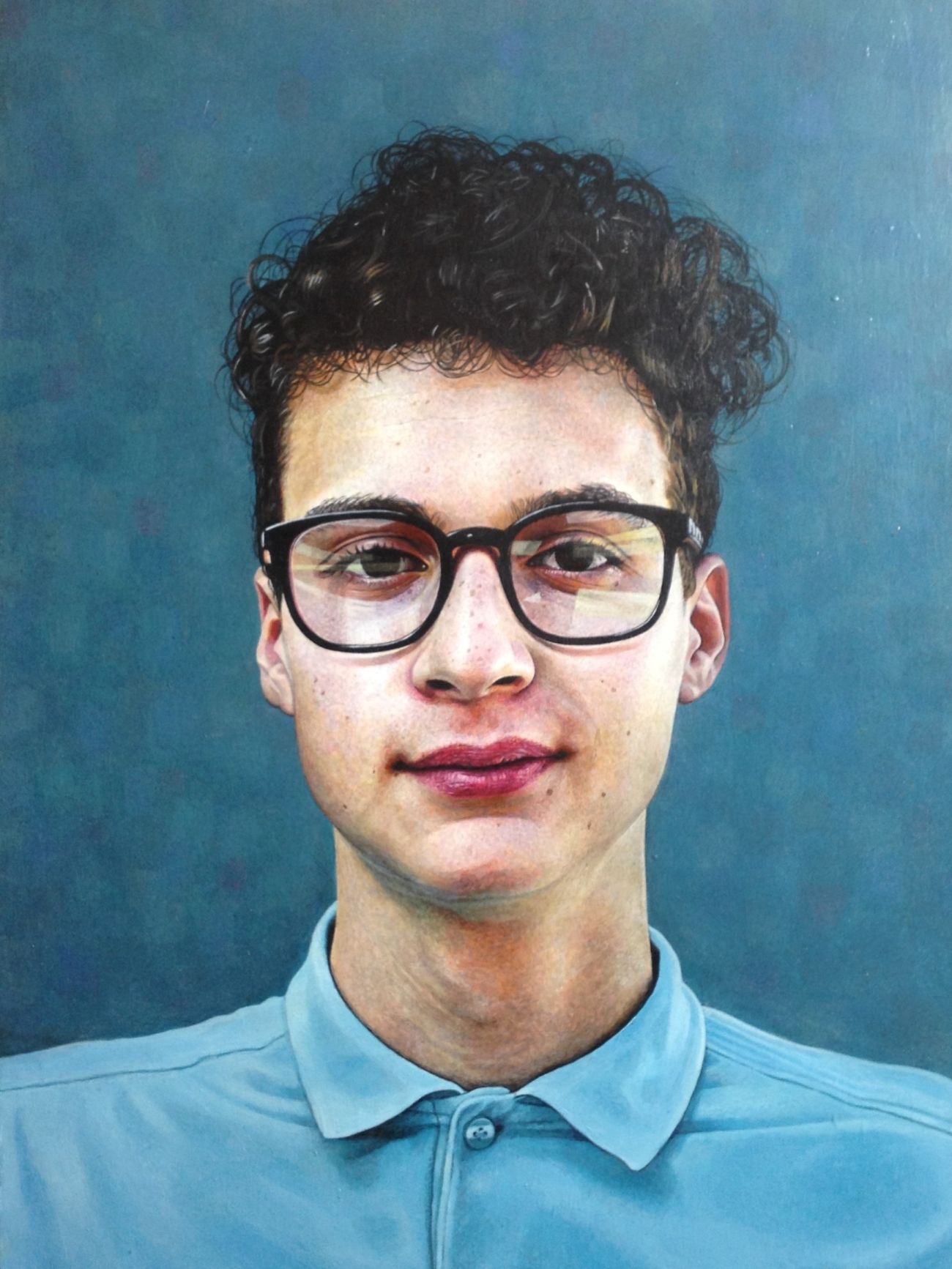 A young man with glasses